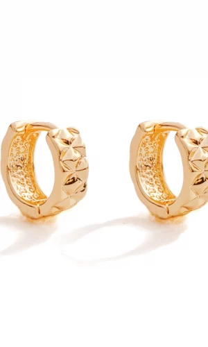 Diahann Diamond textured huggie earrings in gold.