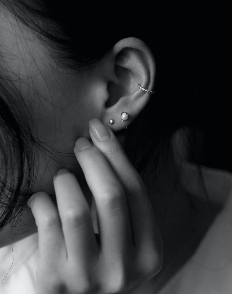 A woman with multiple piercings may be more sensitive to jewelry | best jewelry for sensitive ears